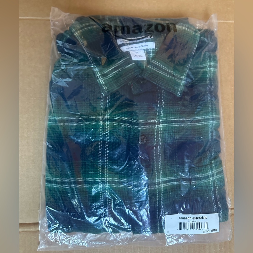 Men’s long sleeve flannel. Size XL. Brand new, still in original bag